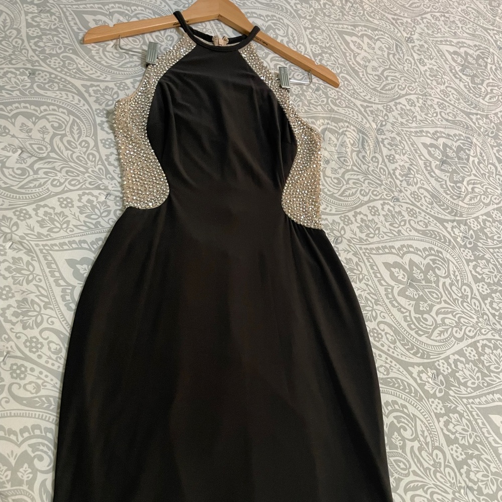Dillard’s charcoal, beaded dress.